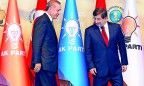 Тень Эрдогана нависает над премьером Турции