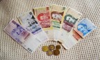 Bloomberg: аргентинский песо - лучшая валюта 2013 года