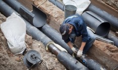 Киев рассчитается с Ахметовым за ремонт труб энергетическими активами