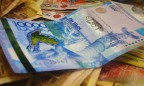 Казахстан провел девальвацию тенге, чтобы стимулировать увеличение экспорта