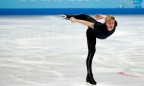 Российский фигурист Евгений Плющенко снялся с олимпийского турнира из-за травмы