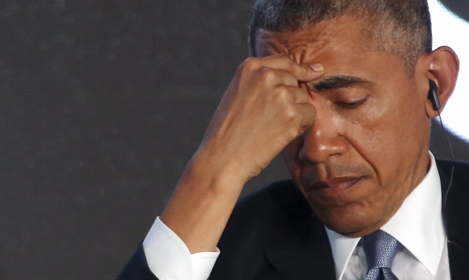 Обама с женой заработали в 2014 году меньше $0,5 млн