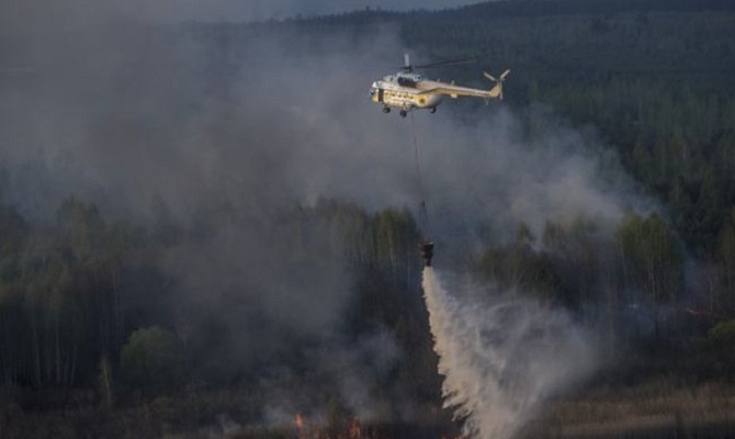 Тушение пожара под Чернобылем продолжается