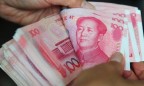 МВФ одобрил девальвацию китайской валюты