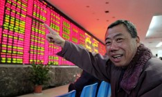 На китайских биржах впервые сработала система автоматической блокировки торгов
