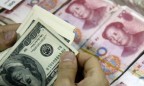Китай планирует обложить валютные операции налогом