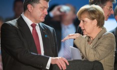 Меркель призвала Порошенко выполнить свою часть Минских договоренностей