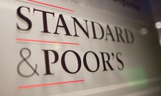 Standard&Poor’s повысило прогноз по кредитному рейтингу РФ до «стабильного»