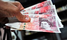 Фунт в паре с долларом в октябре потерял около 6%