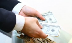 Еврокомиссия ухудшила прогноз роста экономики США