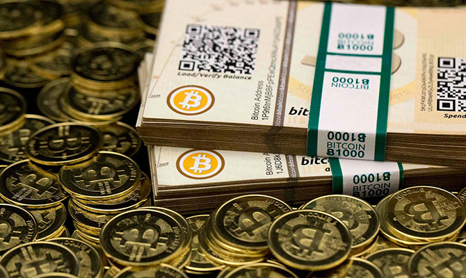 Bitcoin за сутки подешевел до 11,94 тыс. долларов