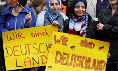 Германия завершает прием беженцев из Италии и Греции