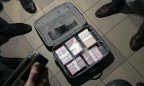 Под Киевом главу района задержали с миллионной взяткой в чемодане