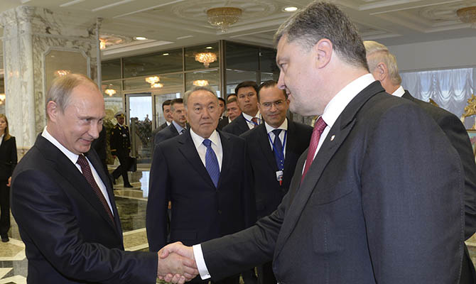 Путин и Порошенко обсудили дело Сенцова и минские договоренности