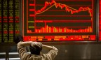 Торги на китайских биржах завершились обвалом котировок